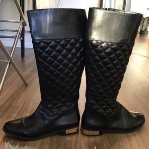 Black leather Vince Camuto boots with gold heal
